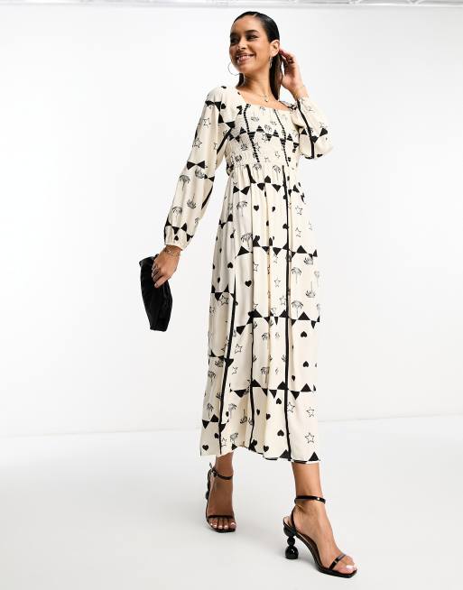 Never Fully Dressed - Robe longueur mollet froncée à imprimé cœurs - Noir et blanc