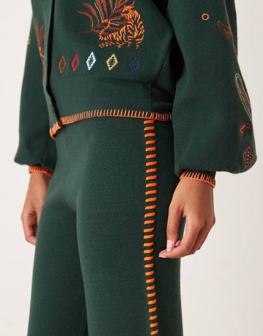 Never Fully Dressed safari embroidered knitted trouser co-ord in bottle green, 2 of 5