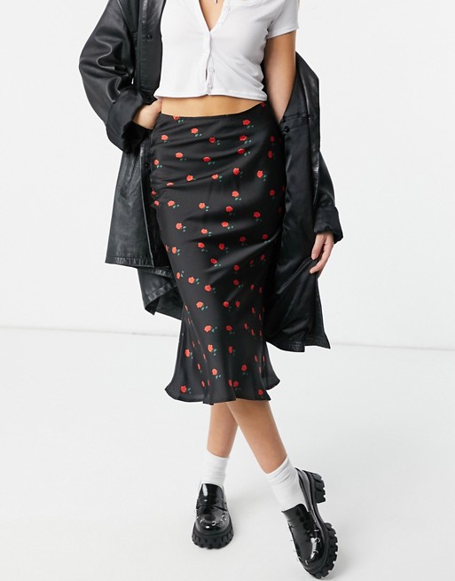 Never Fully Dressed satin skirt co-ord in black rose print