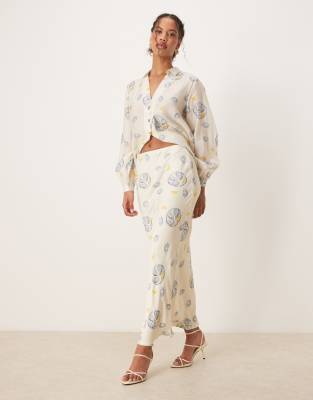 Never Fully Dressed satin slip maxi skirt co-ord in oyster lemon print - view 1
