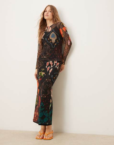 Never Fully Dressed mesh maxi skirt co-ord in multi-colour motif