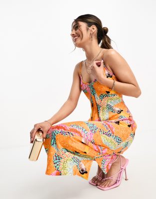 Never Fully Dressed slip maxi dress in orange toucan print - ASOS Price Checker