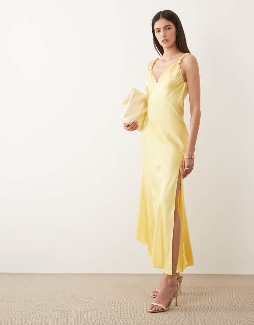 Never Fully Dressed - Sofia - Vestito lungo in raso giallo limone con spalline annodate e taglio sbieco