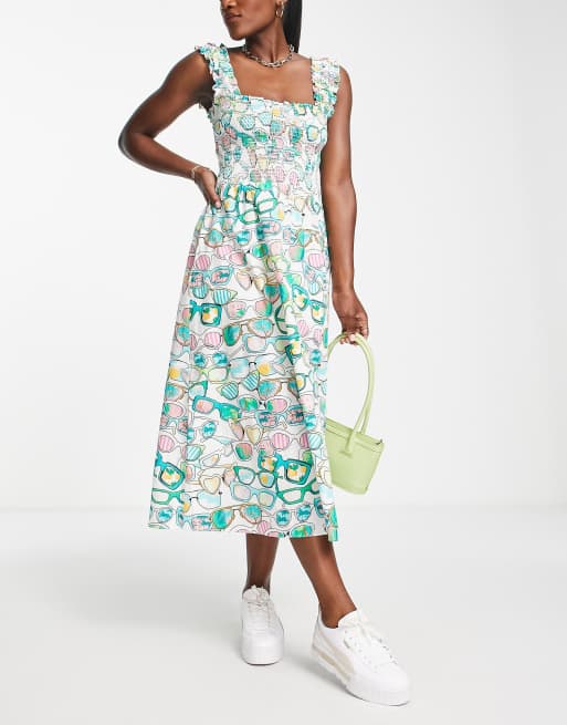 Never Fully Dressed - Sunnies - Lange gesmokte jurk met print in multi