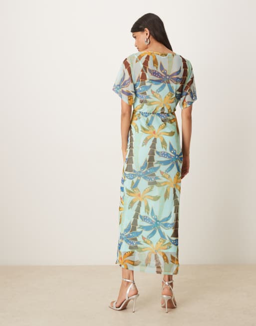 Never Fully Dressed Tilly off asymmetric mesh maxi dress in blue palm print