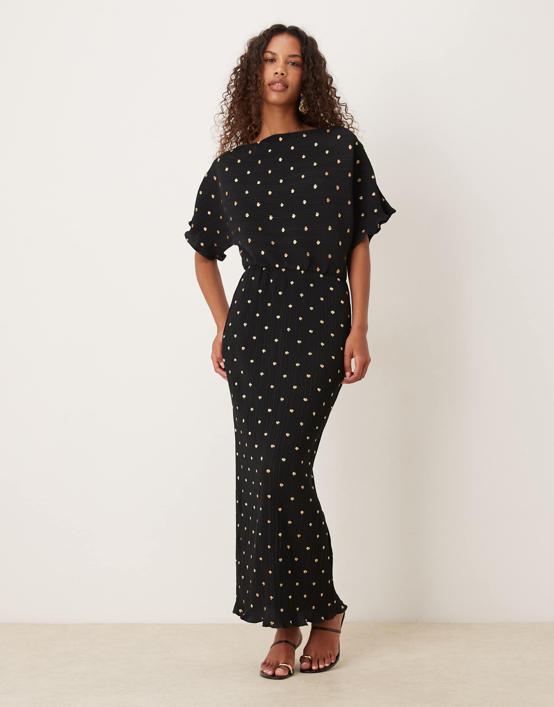 never fully dressed tilly off shoulder plisse maxi dress in black and gold