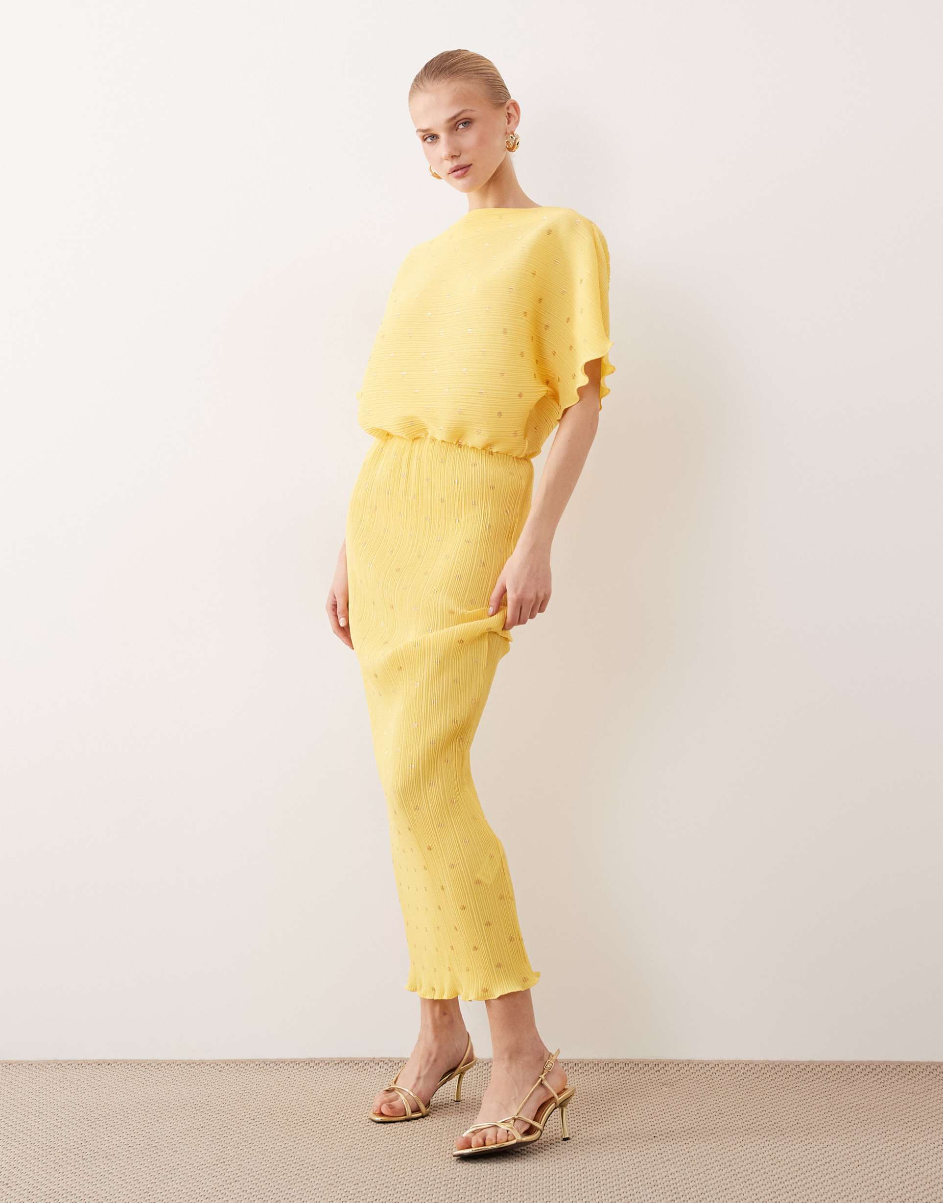 never fully dressed tilly off shoulder plisse maxi dress in metallic yellow spot
