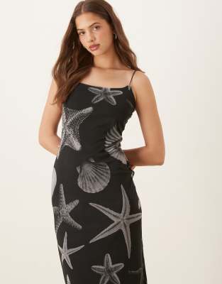 Never Fully Dressed - Trägerkleid aus Netzstoff in Schwarz mit Muschelprint