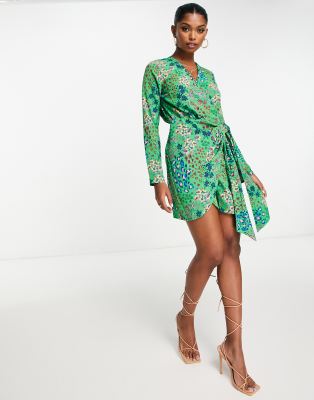 Shop Never Fully Dressed Wrap Tie Mini Dress In Emerald Leopard-green