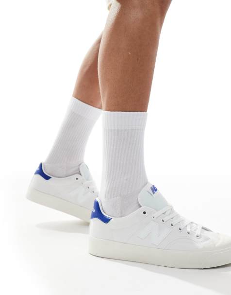 New Balance 100 trainers in white and blue - view 1