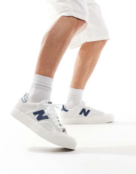 New Balance 100 trainers in white and blue - view 1