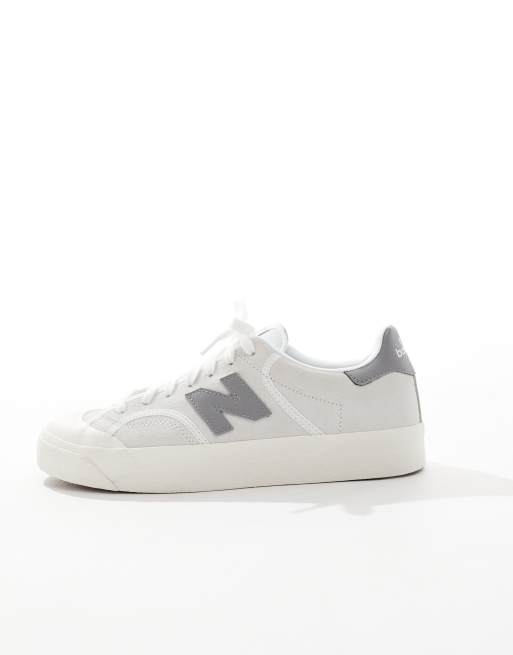 New Balance 100 trainers in white and grey ASOS