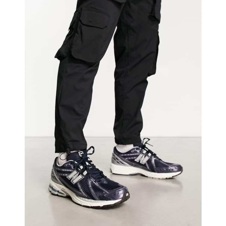 New Balance 1906 Baskets Marine et argent