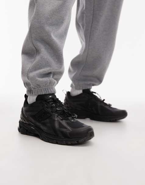 New Balance – 1906 – Buty sportowe unisex w trzech odcieniach czerni ze ściągaczem - view 1