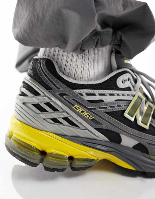 New Balance - 1906 - Sneakers in donkergrijs en geel, 3 van 5