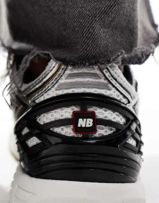 New Balance 1906 sneakers in gold and black, 5 of 5
