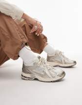 New Balance 740 unisex trainers in white, silver and beige detail