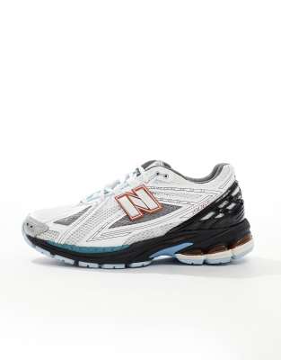 New Balance 1906 sneakers in white with black and silver details