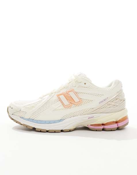 New Balance 1906 sneakers in white with blue and pink details - view 1