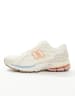 New Balance 1906 sneakers in white with blue and pink details