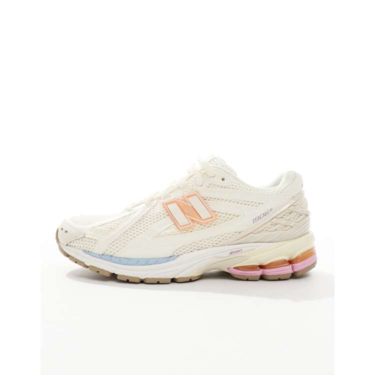 New Balance 1906 sneakers in white with blue and pink details ASOS