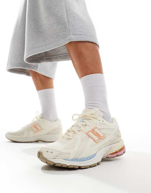 New Balance 1906 sneakers in white with blue and pink New Balance 1906 sneakers in white with blue and pink