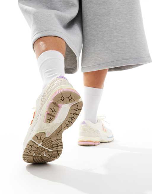 New Balance 1906 sneakers in white with blue and pink details, 3 of 5