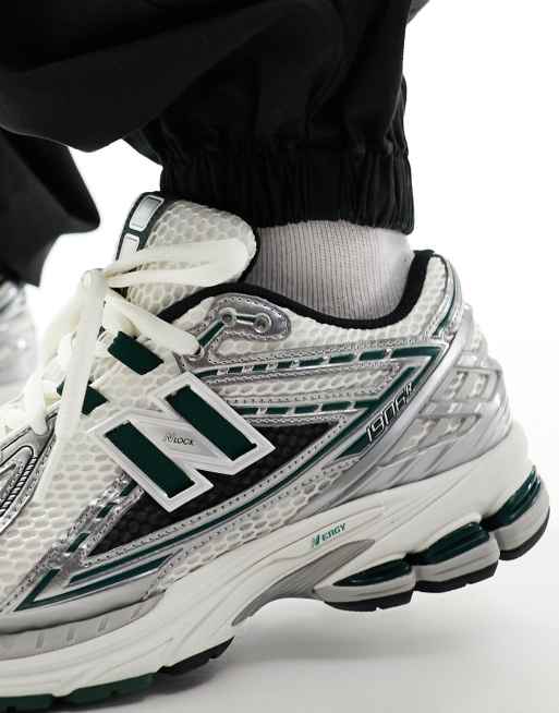 New Balance 1906 sneakers in white with silver and green