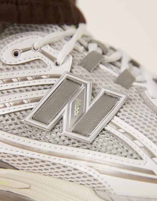 New Balance 1906 trainers in grey and yellow, 3 of 5
