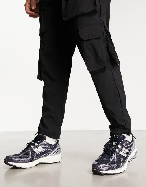 New Balance 1906 trainers in navy and silver | ASOS