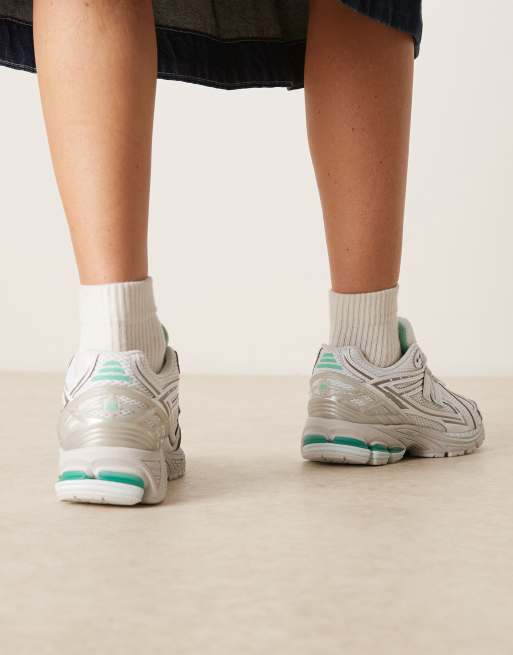 New Balance 1906 trainers in white and blue, 4 of 5
