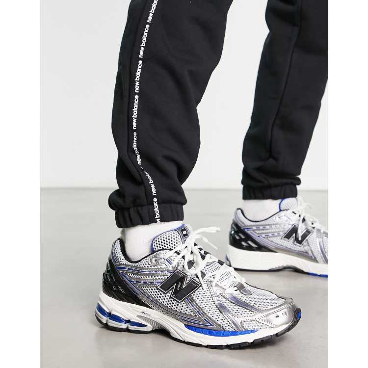 New Balance 1906 trainers in white metallic and blue with black | ASOS