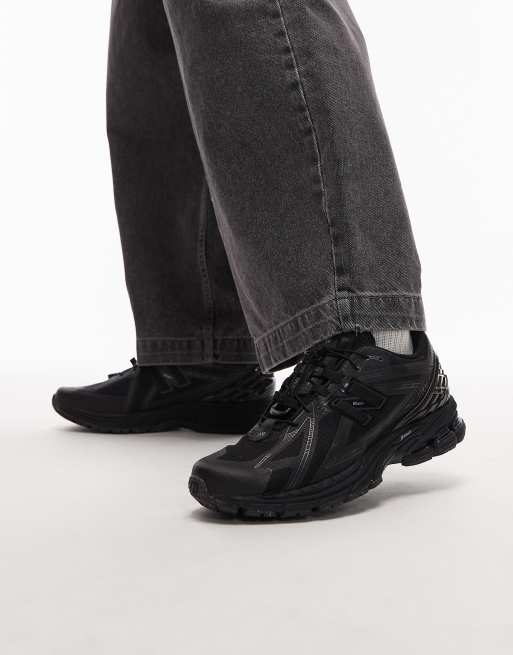 New Balance - 1906 - Uniseks sneakers in drievoudig zwart