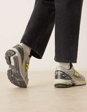 New Balance 1906 unisex trainers in silver metallic and neon yellow