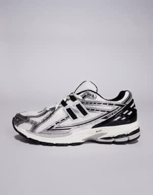 New Balance 1906 unisex trainers in white and silver