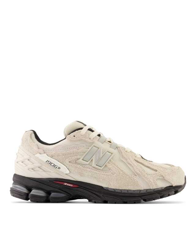 New Balance 1906D sneakers in cream with black detail