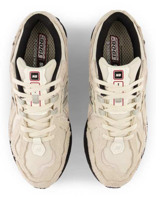 New Balance 1906D sneakers in cream with black detail