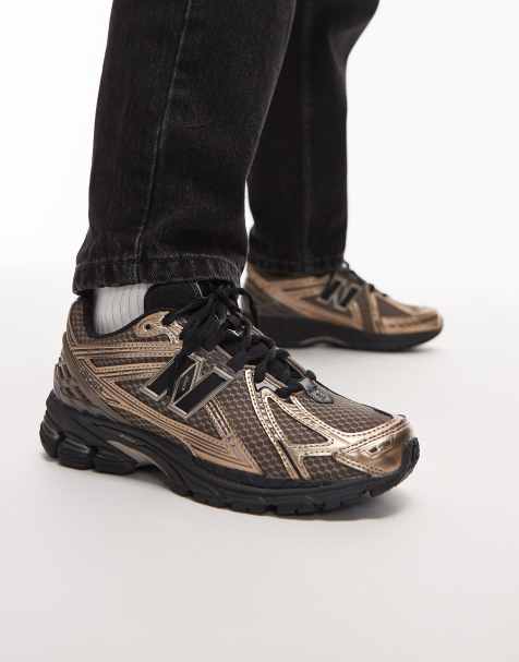 New Balance – 1906R – Czarno-złote buty sportowe unisex - view 1