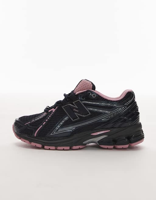 New Balance 1906r trainers in black and pink