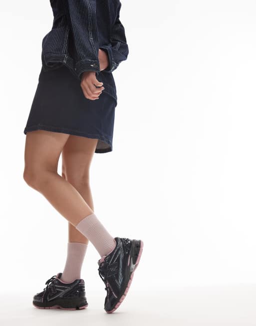 New Balance 1906r trainers in black and pink