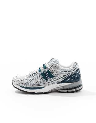 New Balance 1906R sneakers in silver and black 