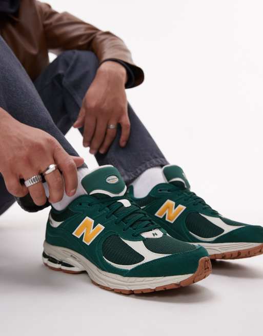  New Balance 2002 collegiate trainers in green and gold Exclusive at ASOS