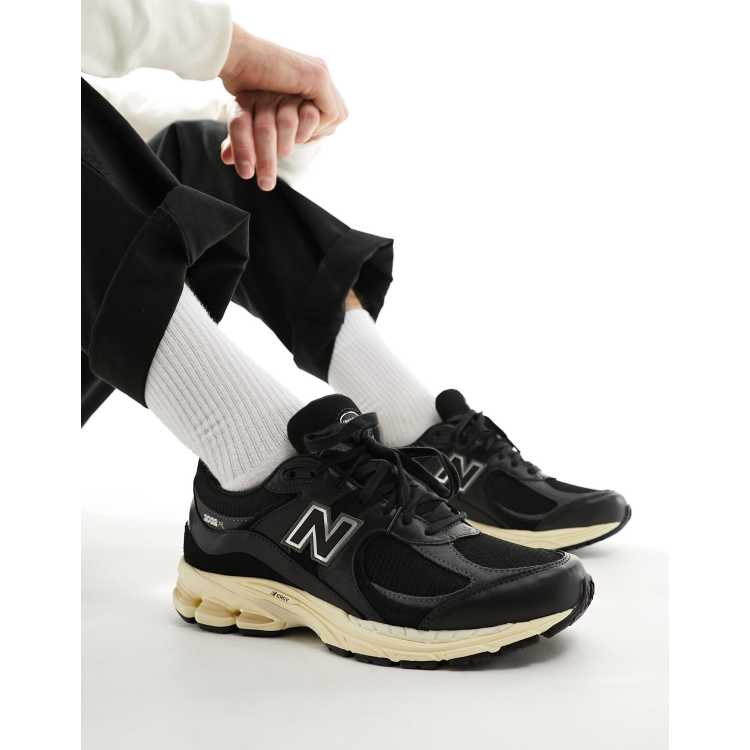 New Balance – 2002 – Czarne skórzane buty sportowe | ASOS