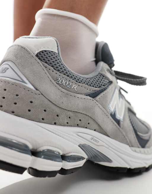 New Balance 2002 sneakers in gray multi