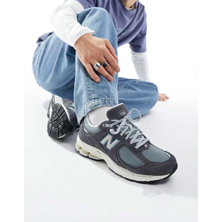 New Balance 2002 sneakers in gray with blue detail