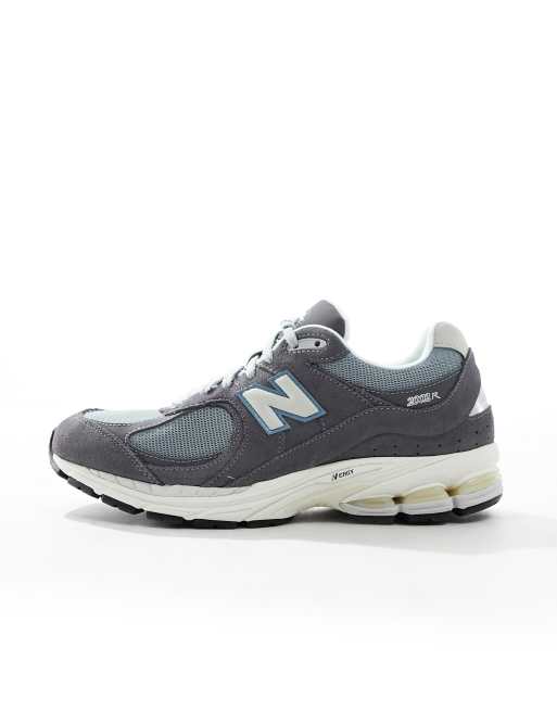 New Balance 2002 sneakers in gray with blue detail | ASOS