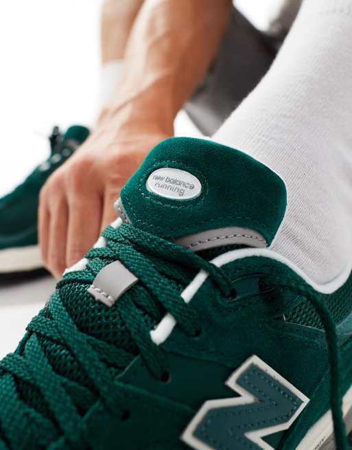 New Balance 2002 sneakers in green multi