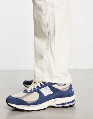 New Balance 2002 trainers in blue and off white