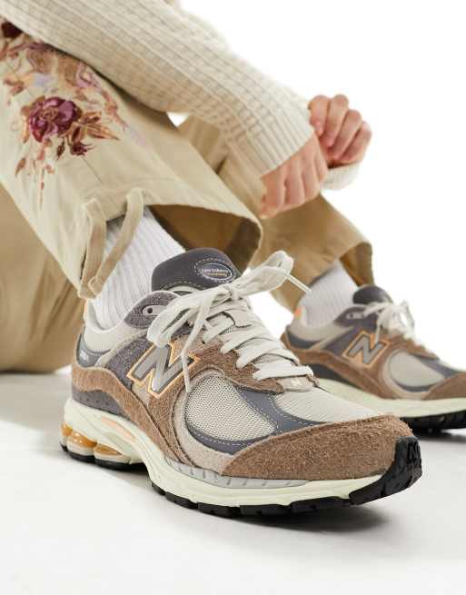 New Balance 2002 trainers in brown and orange