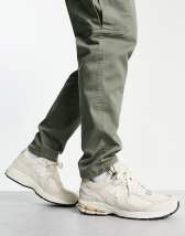 New Balance 1906R sneakers in silver and black 